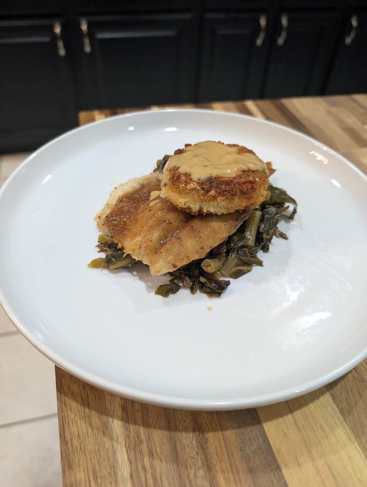 Smothered Fried Chicken over Collard Greens